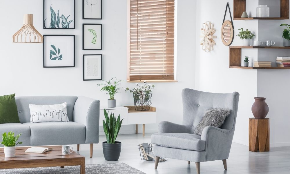 Indoor plants and nature inspired art in living room decor