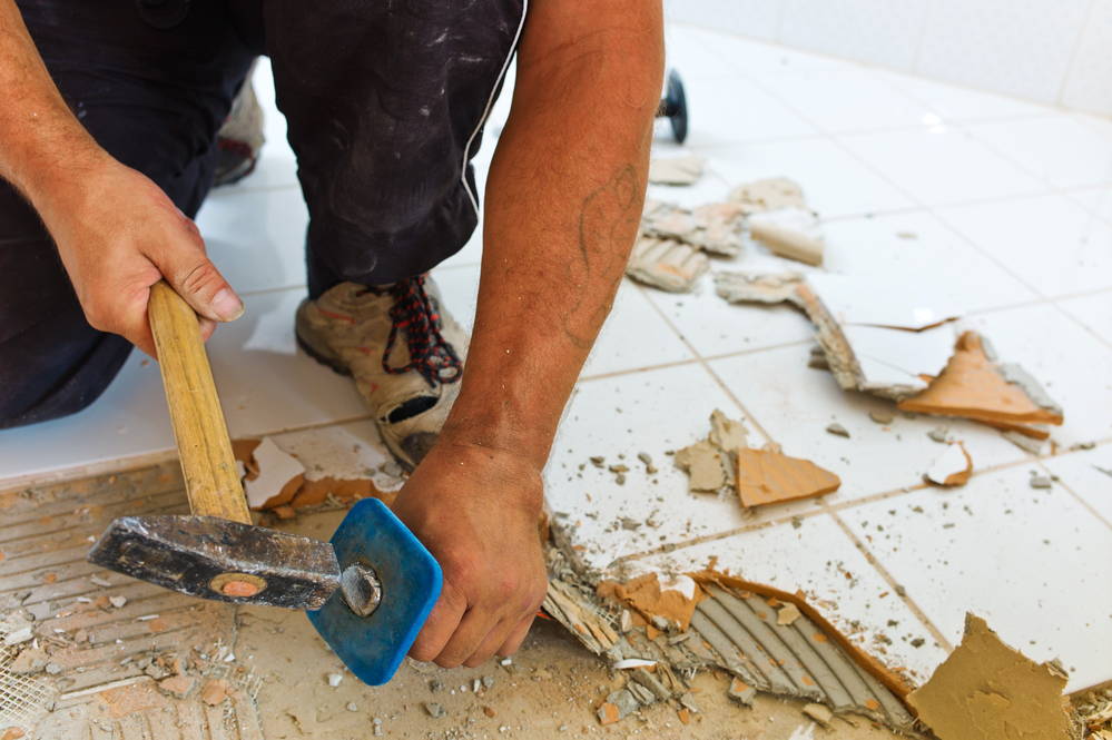 bathroom renovation by a construction worker